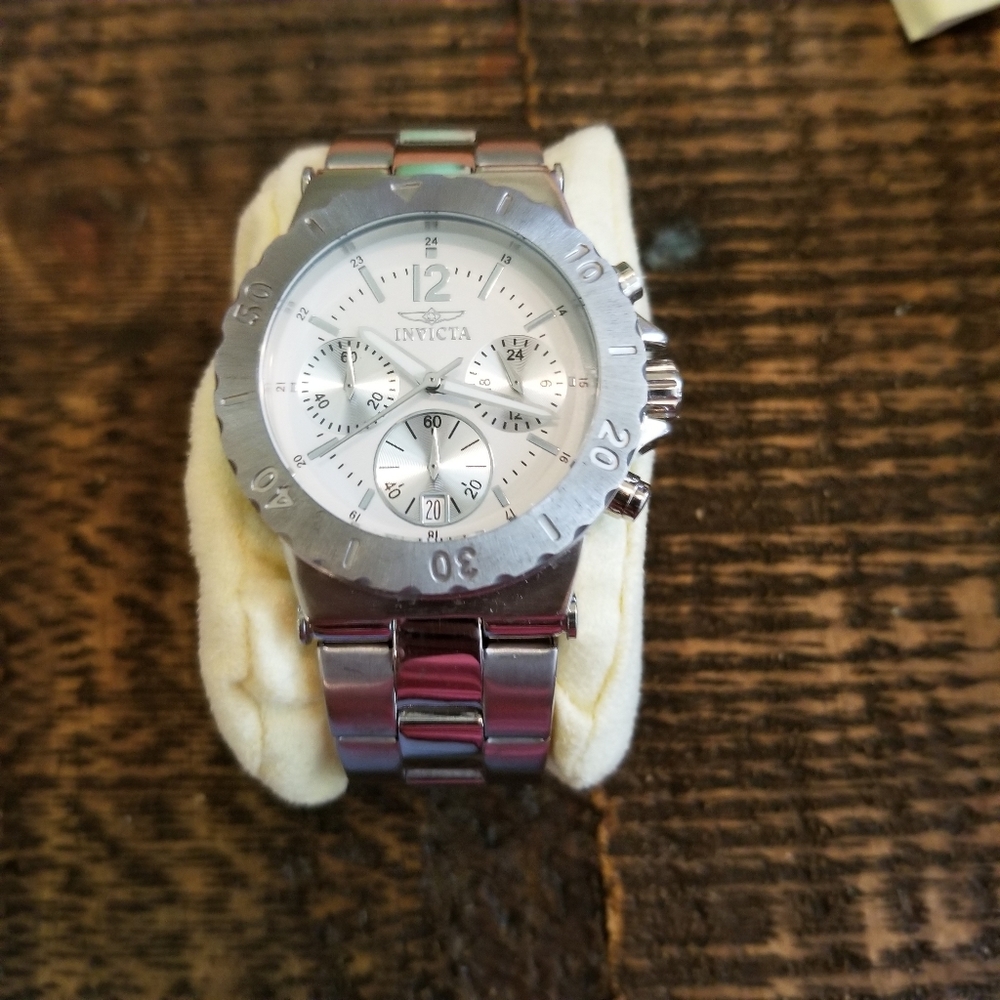 Woman's INVICTA sterling silver "42 bazel